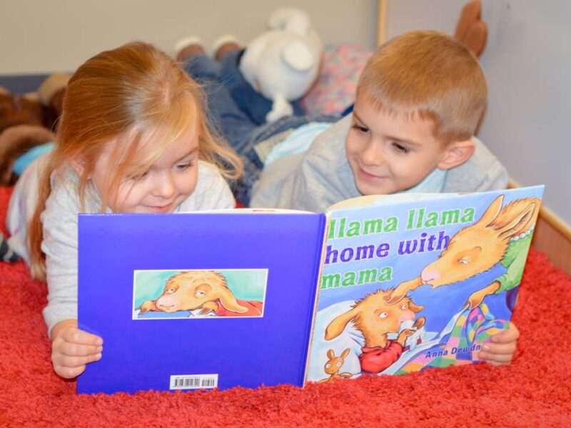 children-reading-at-imaginarion-station-daycare